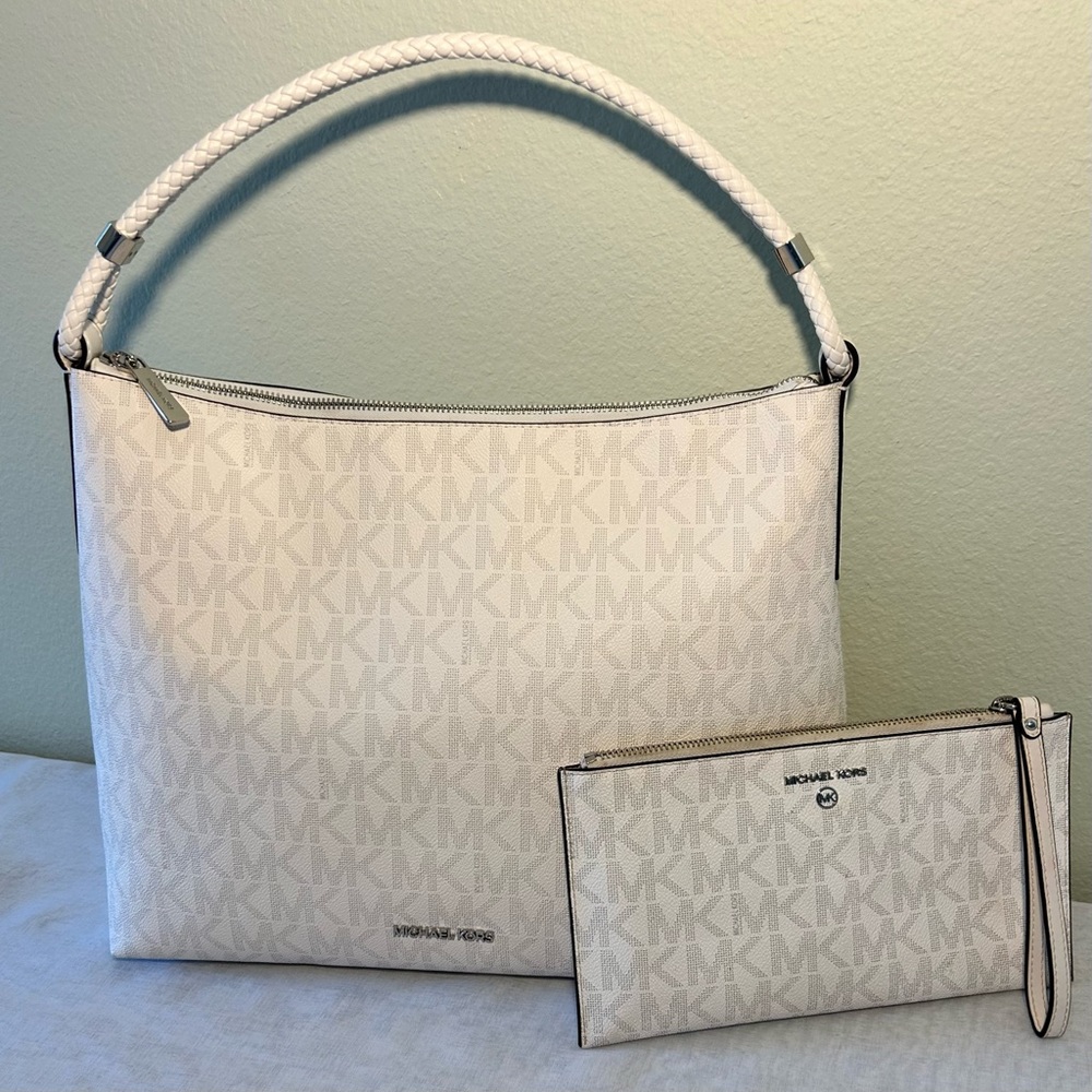 Michael Kors large shoulder bag, and gently used matching wallet/w wrist strap.